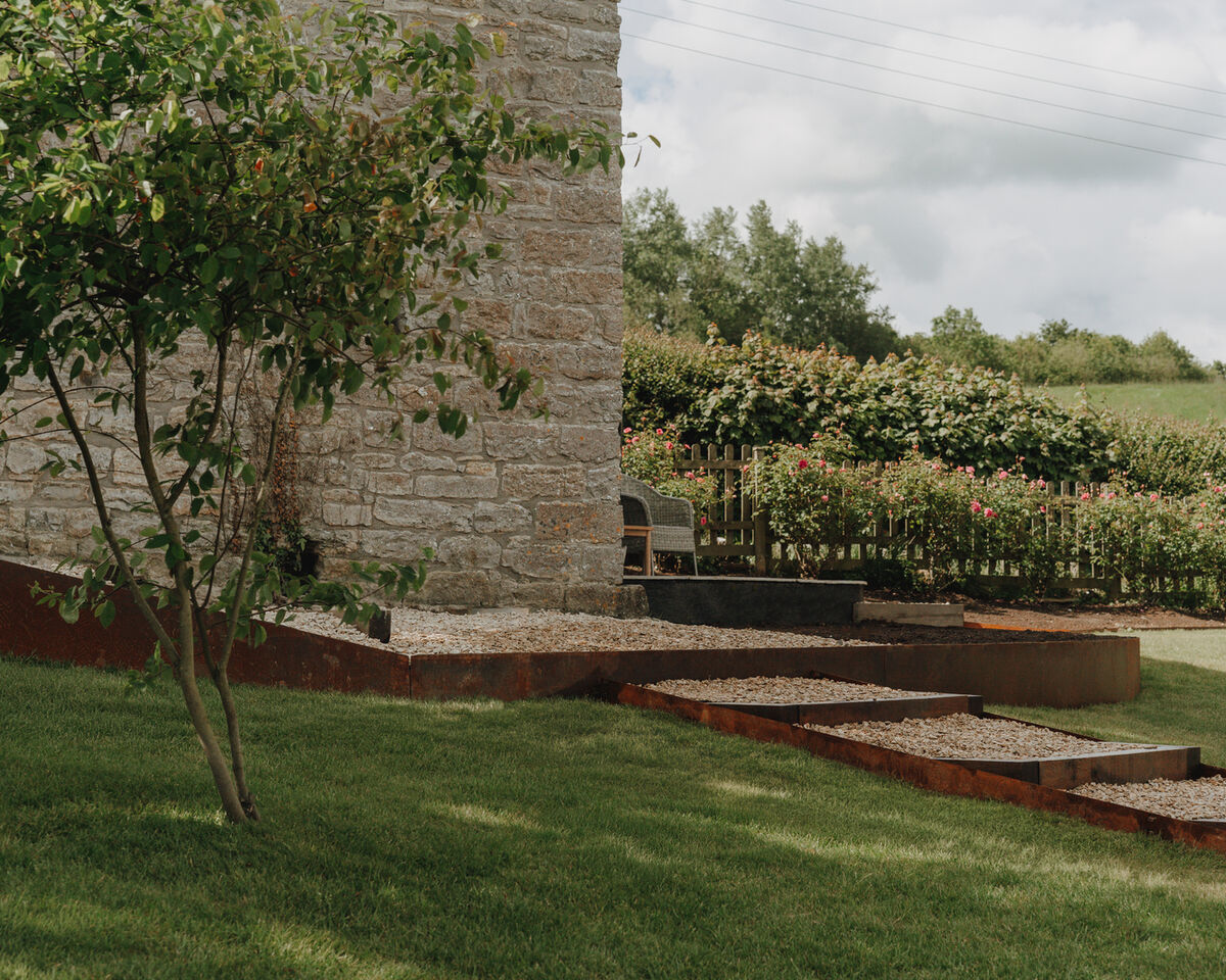 Sloping garden terracing and steps, Weare, Axbridge