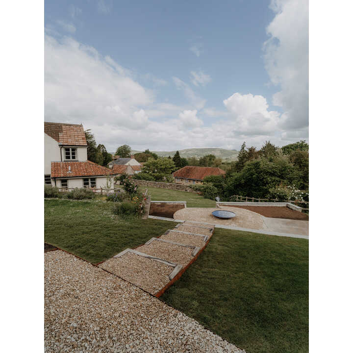 Reclaimed stone path and new lawn, sloping garden, Weare, Axbridge