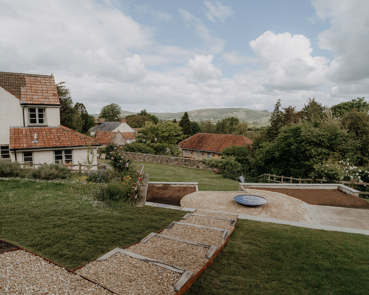 Reclaimed stone path and new lawn, sloping garden, Weare, Axbridge