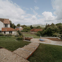 Reclaimed stone path and new lawn, sloping garden, Weare, Axbridge